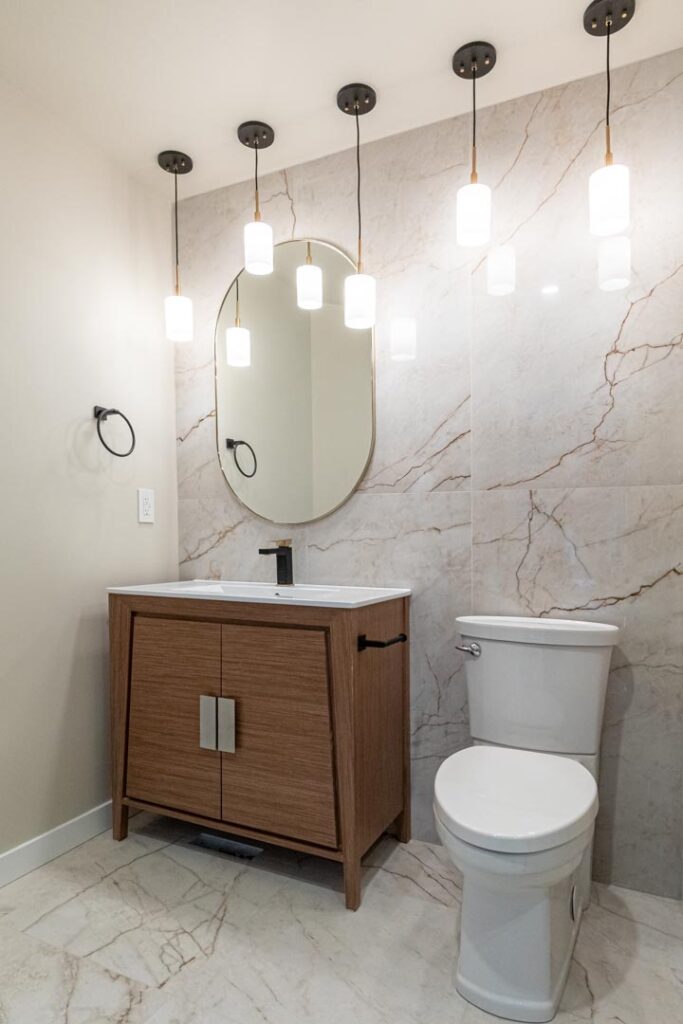 Cluster pendant lighting in a powder room by North Star Electric in Winnipeg, Manitoba