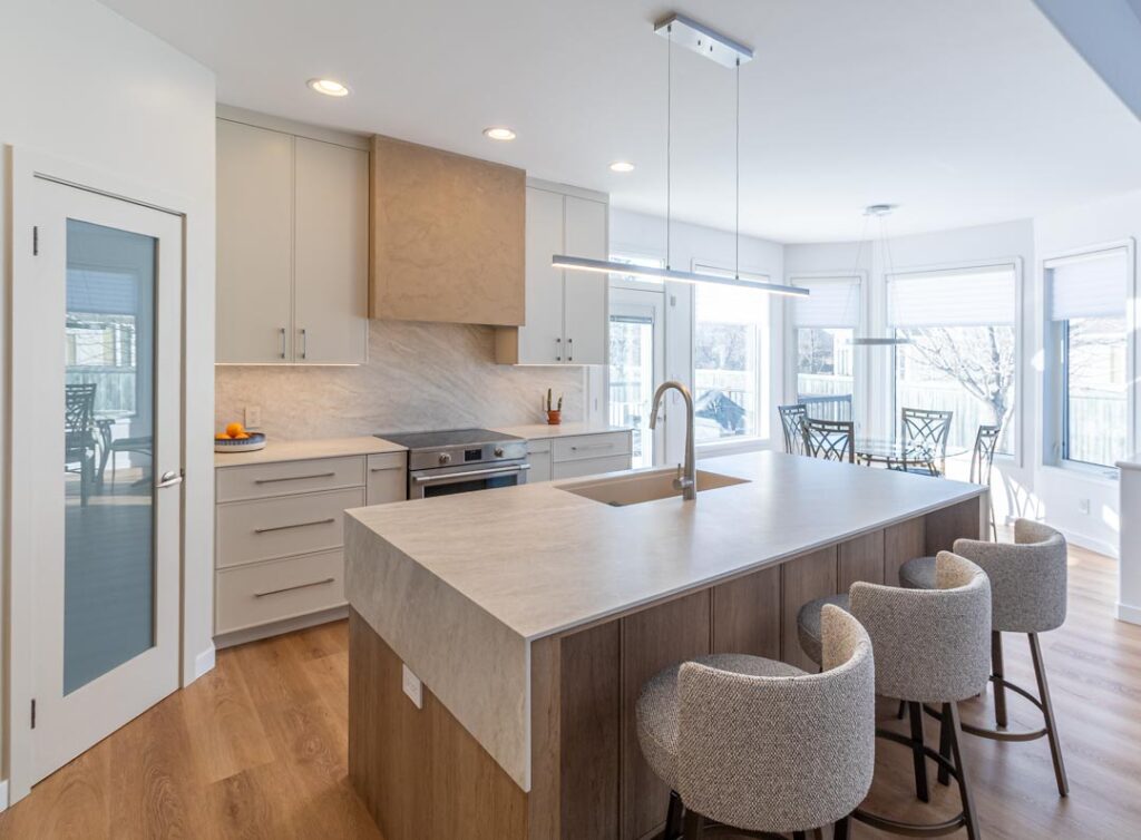 Pot-light installation in a bright modern kitchen by North Star Electric in Winnipeg, Manitoba