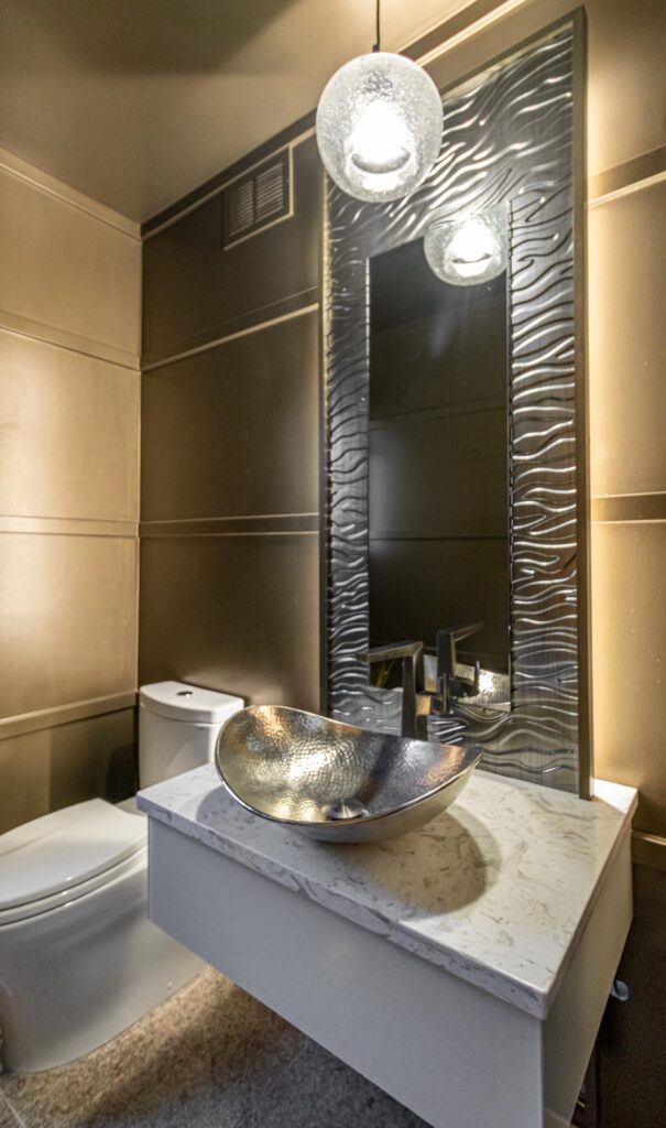Pendant lighting above a double vanity by North Star Electric in Winnipeg, Manitoba