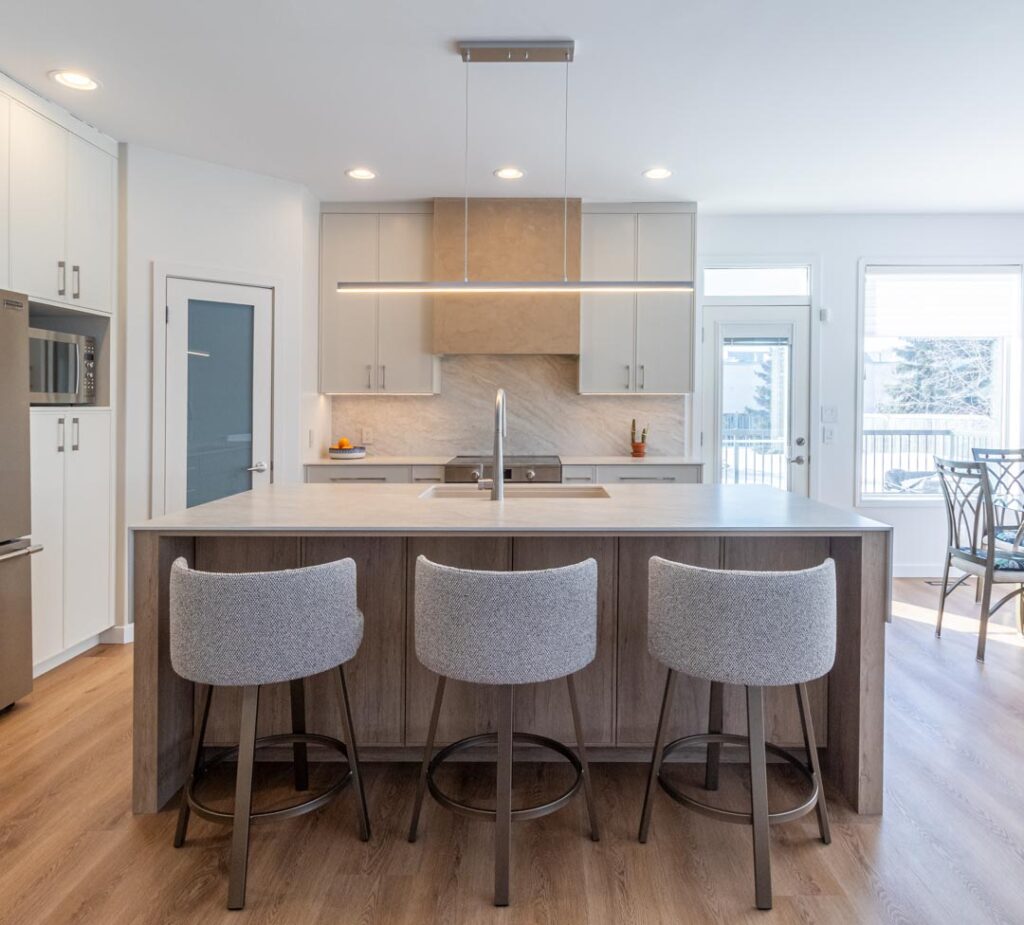 Recessed lighting in an open-concept kitchen by North Star Electric in Winnipeg, Manitoba